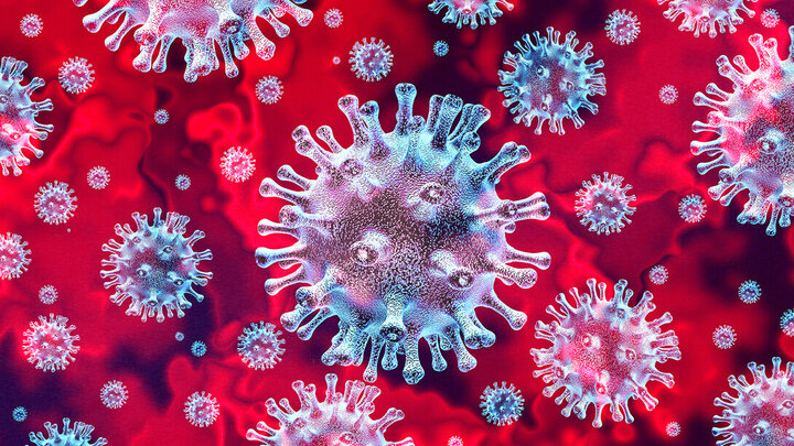 artistic image of viruses (mostly blue) on a red background